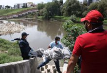 Protección Civil Municipal, rescate, canal de aguas negras, río Atoyac, cadáveres